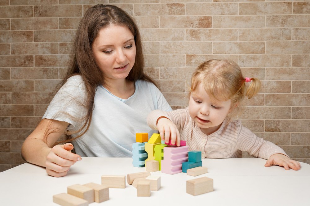 Child playing with an interactive educational toy with your mom in 2025