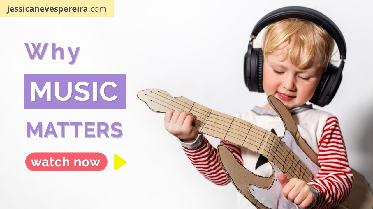 Child with headphones playing cardboard guitar