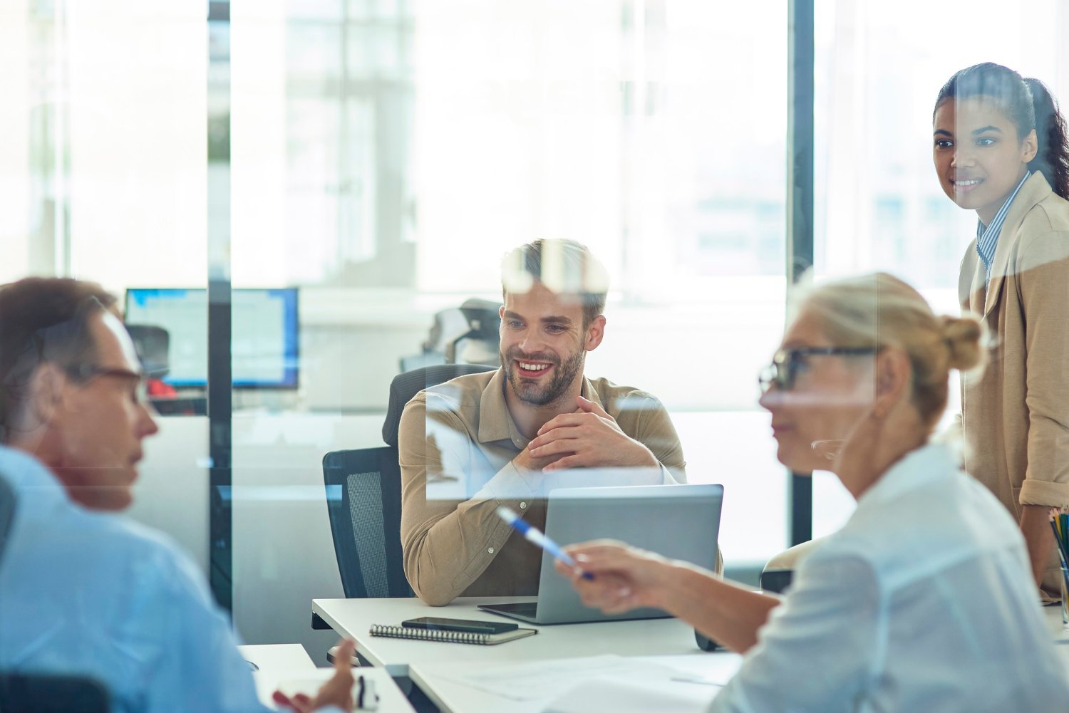 Facility service managers analyzing performance data to justify AI investment