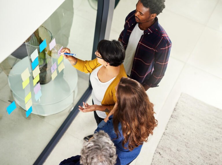 Professionals analyzing strategic ideas based on artificial intelligence data