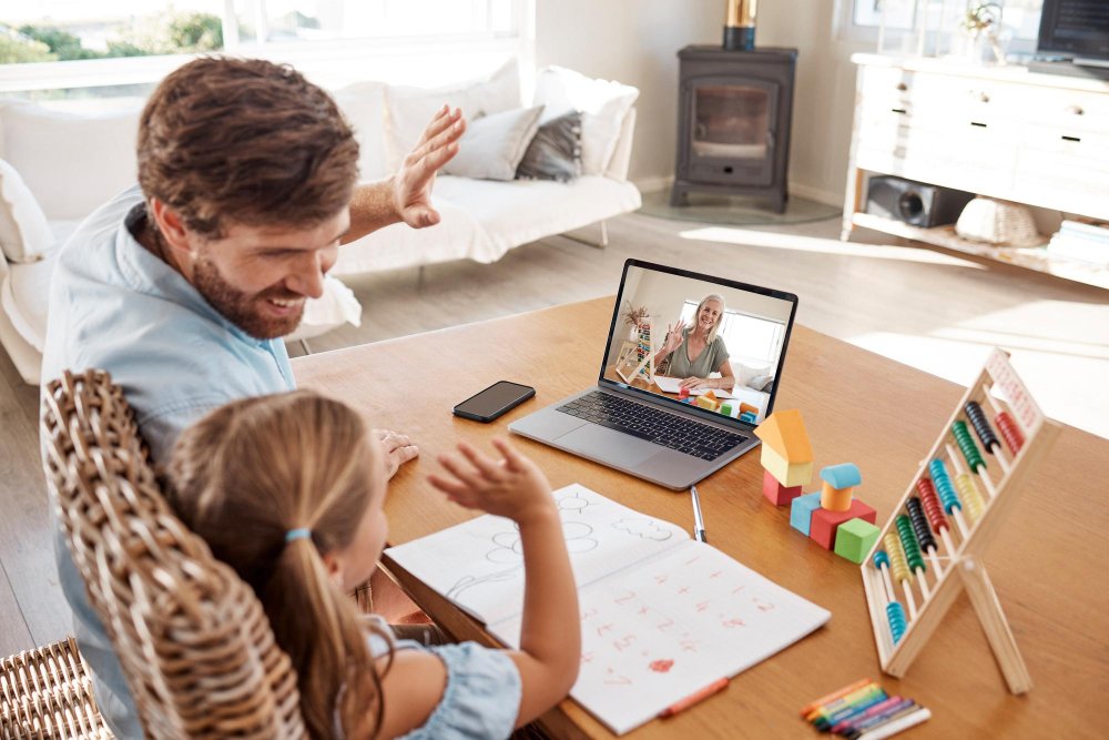 Father and daughter exploring toy deals online during Black Friday
